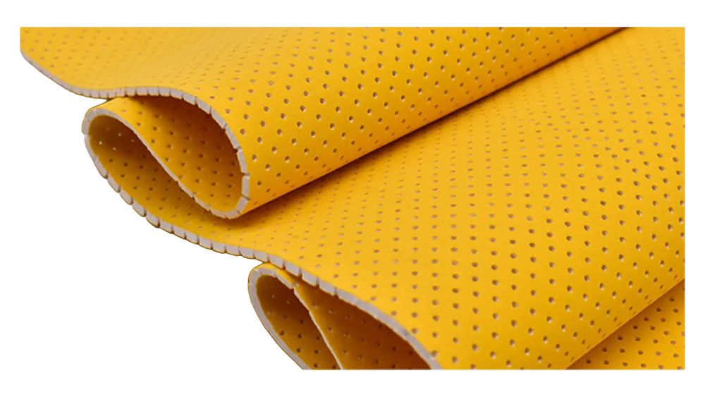 Detail view of precision perforated medical-grade neoprene sheet with custom punched patterns for enhanced breathability