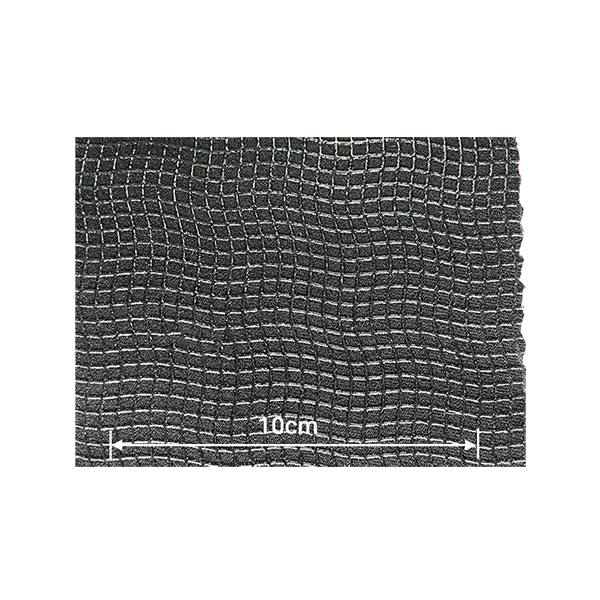 Black neoprene fabric with a white wavy grid anti-slip pattern for protective padding and industrial mats.