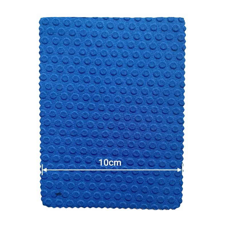 Blue small dot embossed neoprene fabric with 10cm scale for high-volume manufacturing.
