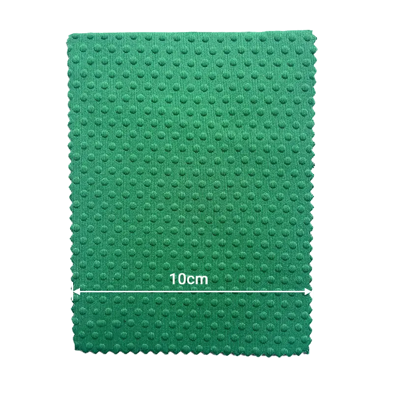 Green small dot embossed neoprene fabric for industrial-grade solutions and protective gear.