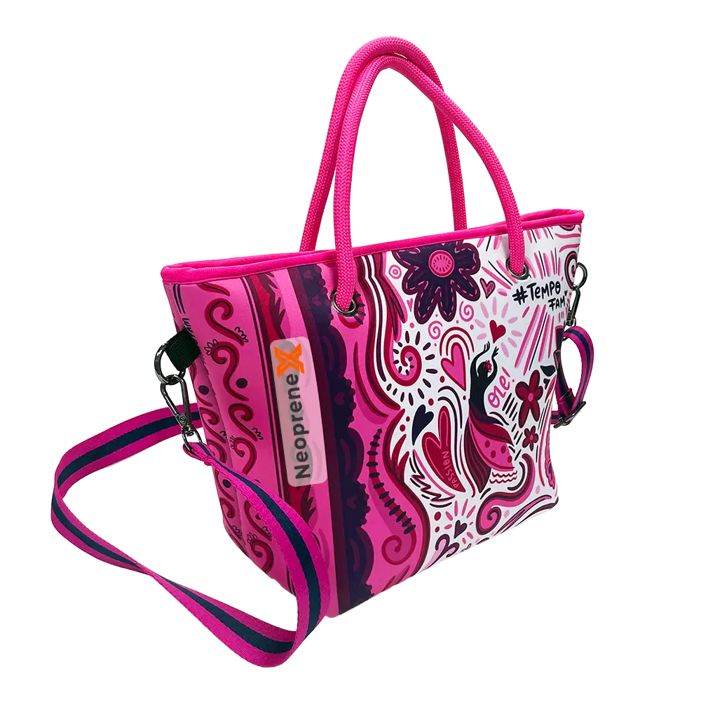 Pink neoprene fashion tote bag featuring vibrant custom illustrations and rope handles.
