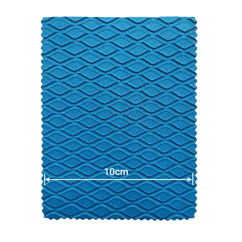 Light blue wavy diamond embossed neoprene fabric with 10cm scale for custom lamination.