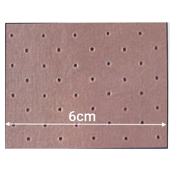 Mauve perforated neoprene fabric with medium-density staggered pinholes for medical liners.