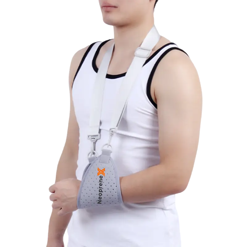 A grey perforated neoprene arm sling designed for patient comfort through enhanced breathable material engineering.