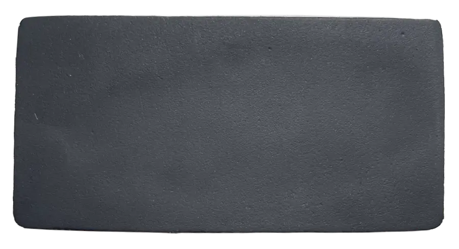 Black natural smooth skin neoprene layer sliced directly from the foam bed for maximum elasticity and zero water drag.