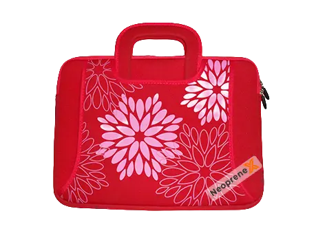 A durable, vibrant red NeopreneX neoprene electronics case with handle and floral pattern, showcasing high-end neoprene stitching designed to withstand the rigors of high-intensity daily use.