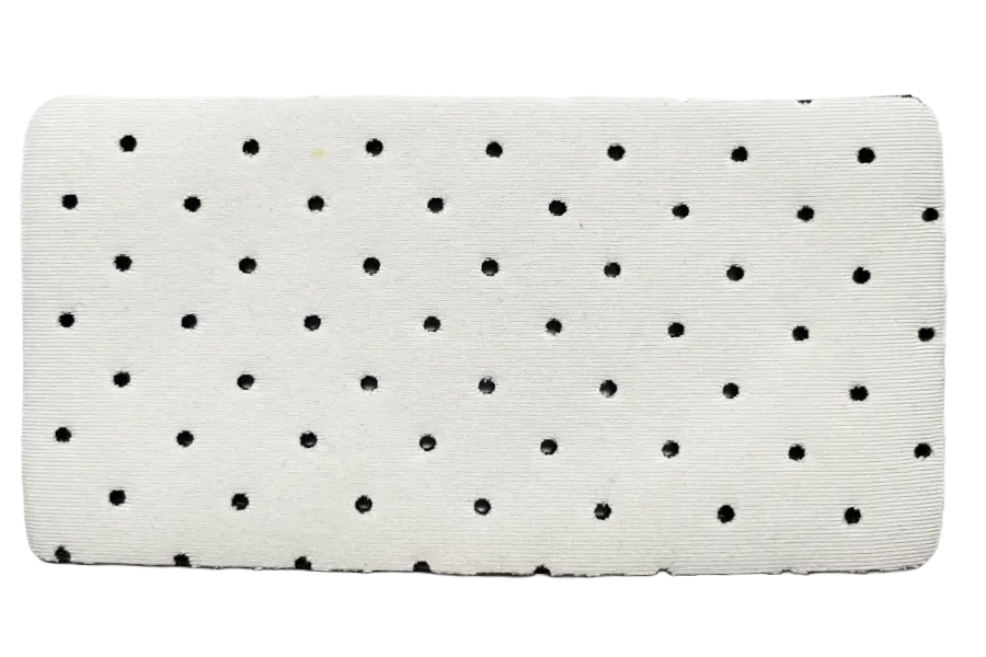Macro view of outer perforated neoprene with clearly visible air-flow holes for maximum ventilation in technical sports gear and activewear.