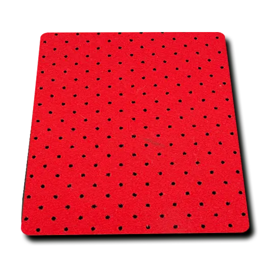 Precision perforated red neoprene fabric for advanced breathable engineering in medical braces and sports liners.