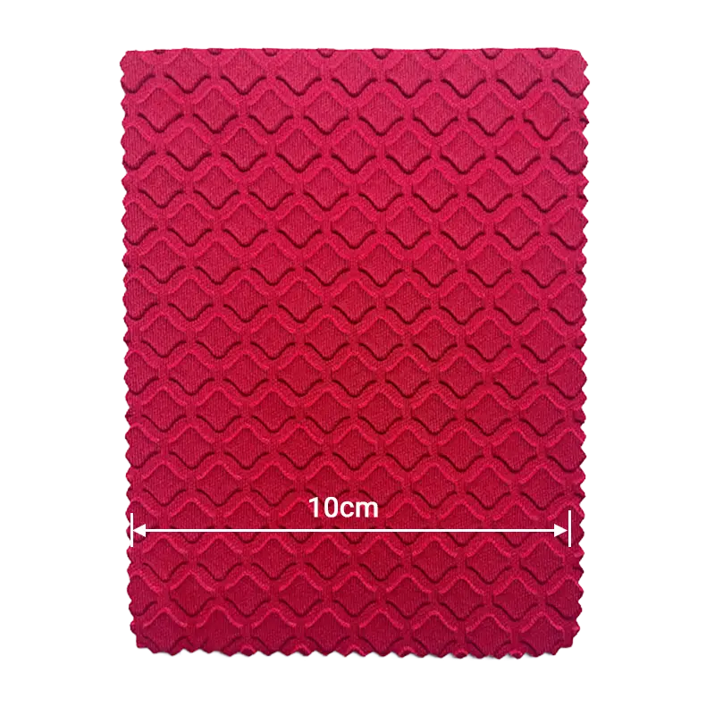 Red wavy diamond embossed neoprene fabric pattern for aesthetic and functional gear.