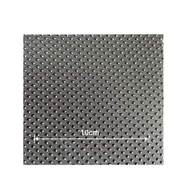 Grey neoprene fabric with densely packed small anti-slip printed dots for medical and sports gear.