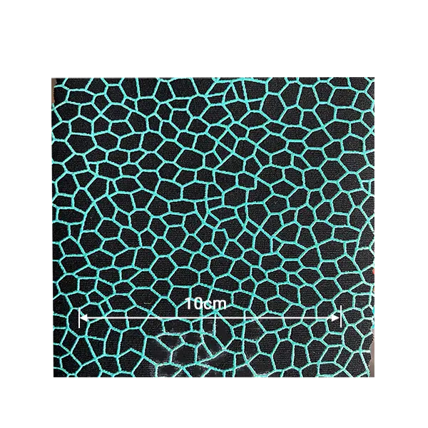 Black neoprene sheet with teal-colored spiderweb anti-slip printing for high-grip industrial applications.