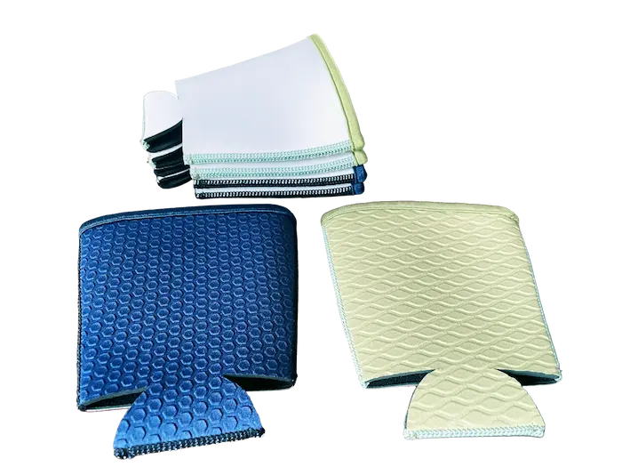 Stacks of professional blank white neoprene coffee sleeves and textured samples for sublimation, engineered as a universal fit for 16oz to 24oz cups with 12.0cm height.