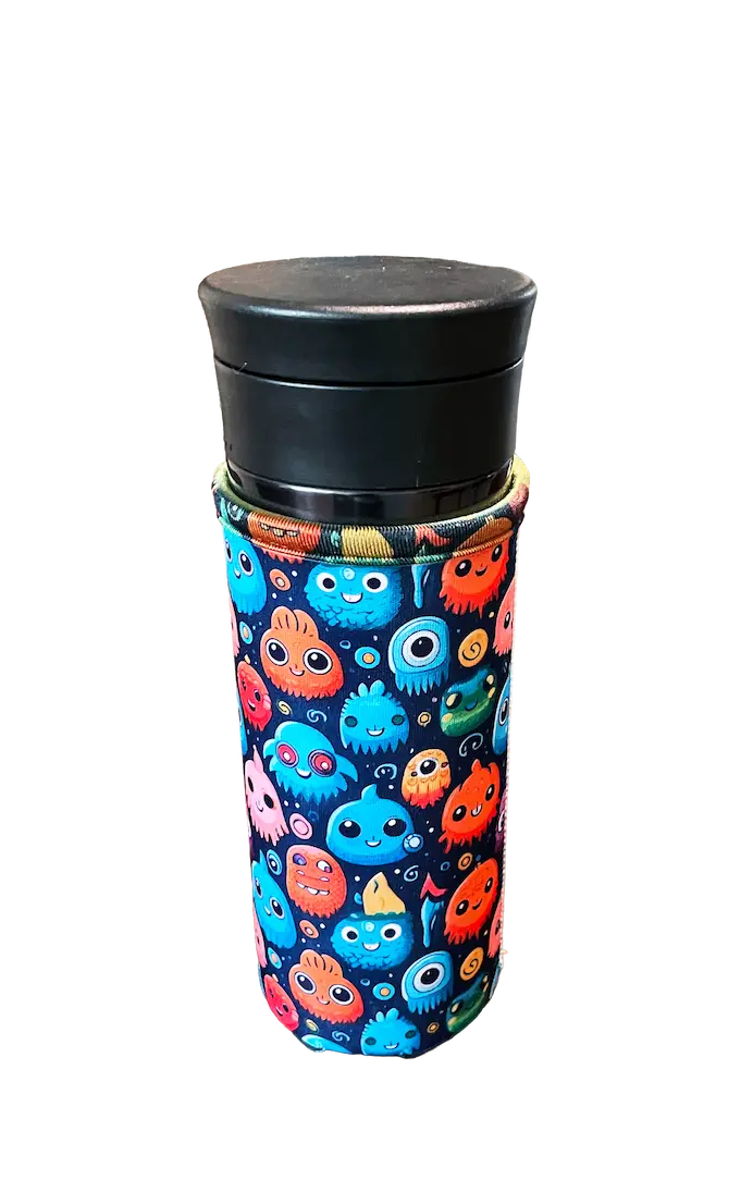 Close-up of a 15cm high-coverage neoprene bottle koozie with a vibrant monster sublimation pattern, showcasing the secure fit on a sport water bottle.