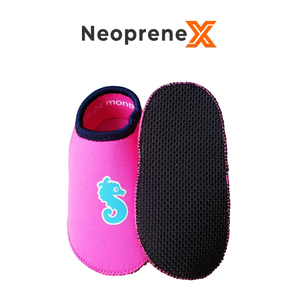 A pair of red NeopreneX baby pool shoes featuring 2mm nylon-laminated neoprene, blue seahorse silk-screen printing, and a snug sock-style fit. Designed with SCR embossed slip-resistant soles for baby and toddler water activities.