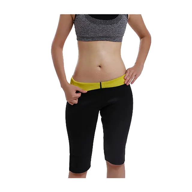 Fitness model wearing black neoprene slimming pants with a yellow inner lining, showing visible sweat on the abdomen to demonstrate the effective sauna-like effect for fitness and shapewear markets.