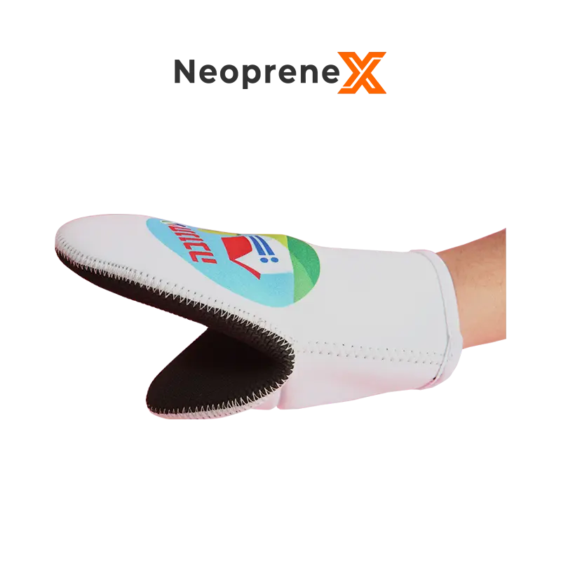 A hand wearing a NeopreneX white custom sublimation printed neoprene pocket mitt against a solid black background. Shows a full-color round graphic print on the upper fabric, a bare unlaminated black embossed rubber non-slip gripping inner palm, zig-zag overlock stitching, and a 3.5mm or 4mm thick thermal core.